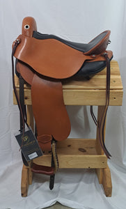 dp saddlery qauntum short and light with western dressage seat, side view on a wooden saddle rack, white background