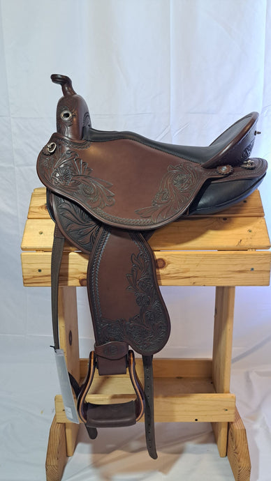 dp saddlery quantum short and light western with a western dressage seat, side view on a wooden saddle rack
