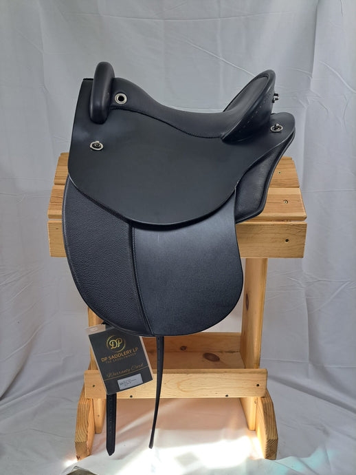 dp saddlery quantum with dressage flaps 6715- side view, on wooden saddle rack, white background