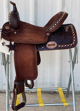 Load image into Gallery viewer, Side view of saddle on saddle rack