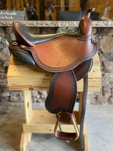 dp saddlery quantum short and light western with a western dressage seat 5773, side view on  wooden saddle rack 