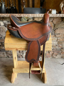dp saddlery quantum short and light western with a western dressage seat 6002, side view on wooden saddle rack 