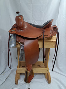 Side view of saddle on wooden saddle rack